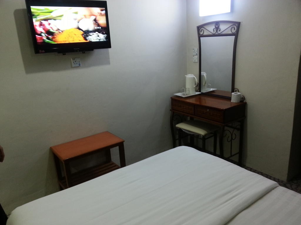 Oriental Inn Kuching Værelse billede