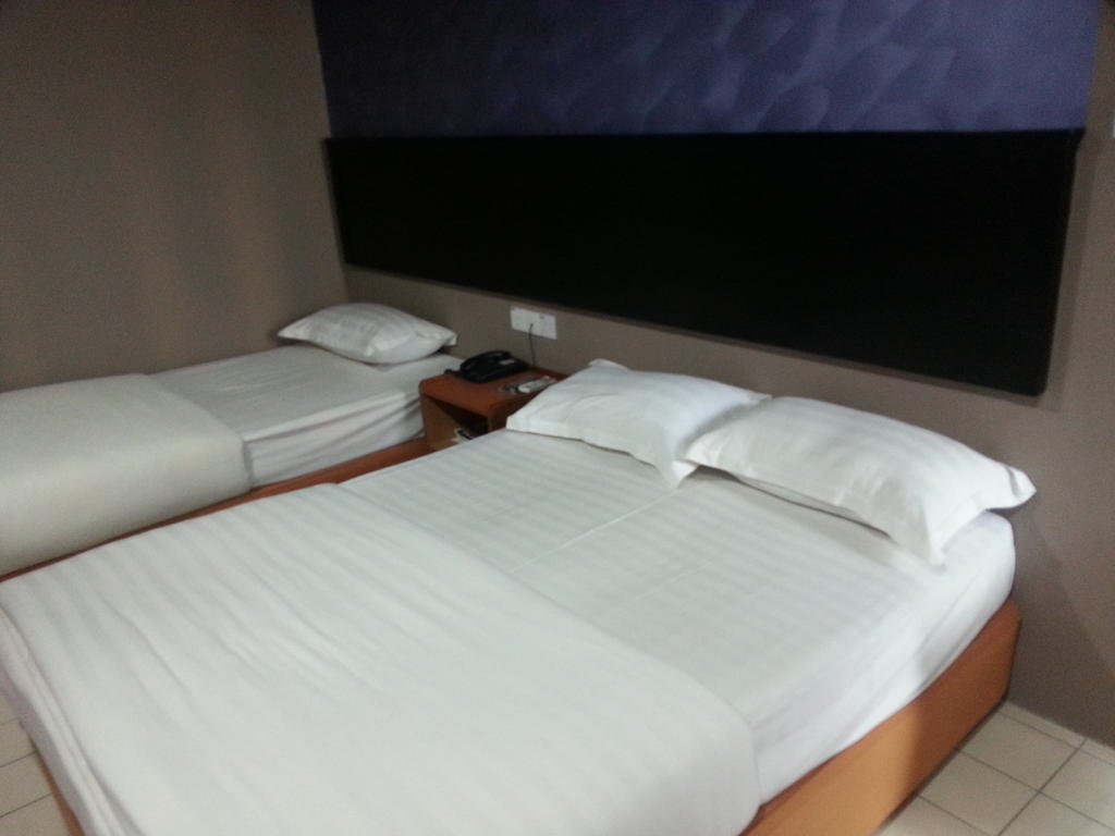 Oriental Inn Kuching Værelse billede
