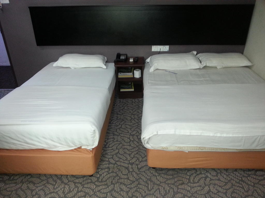 Oriental Inn Kuching Værelse billede